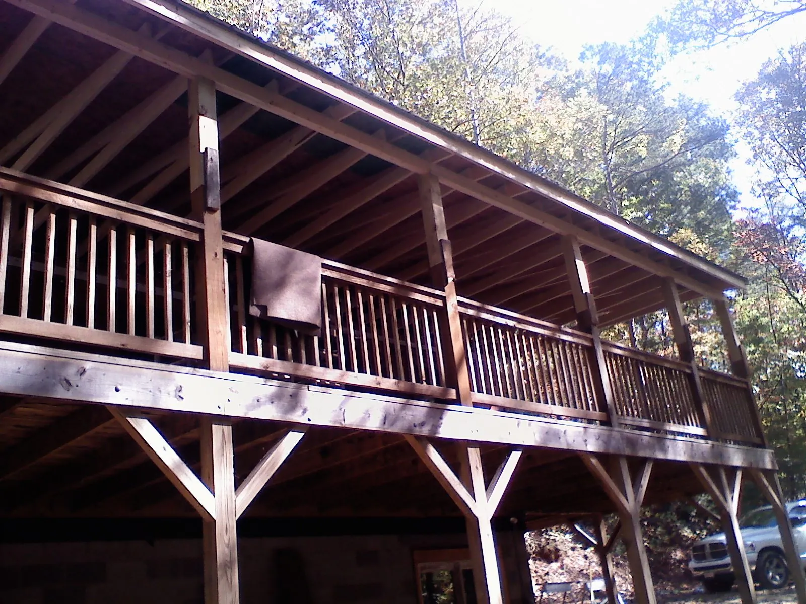 Timber framing under a new elevated porch and deck — Roof Leak Repair in East Sparta by Roofing Brothers